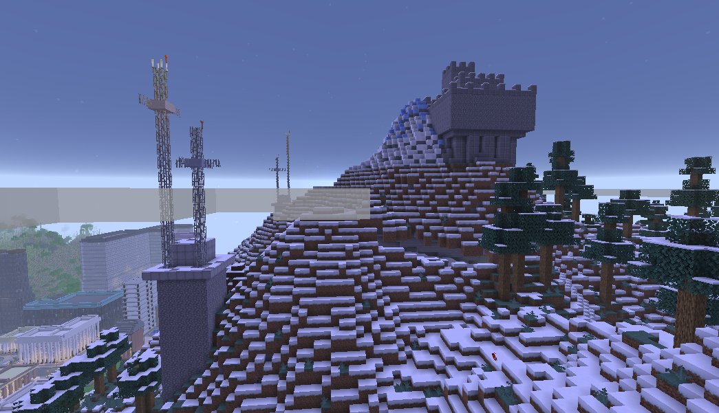 A castle keep crowns a snow-capped peak, radio towers and skyline below.