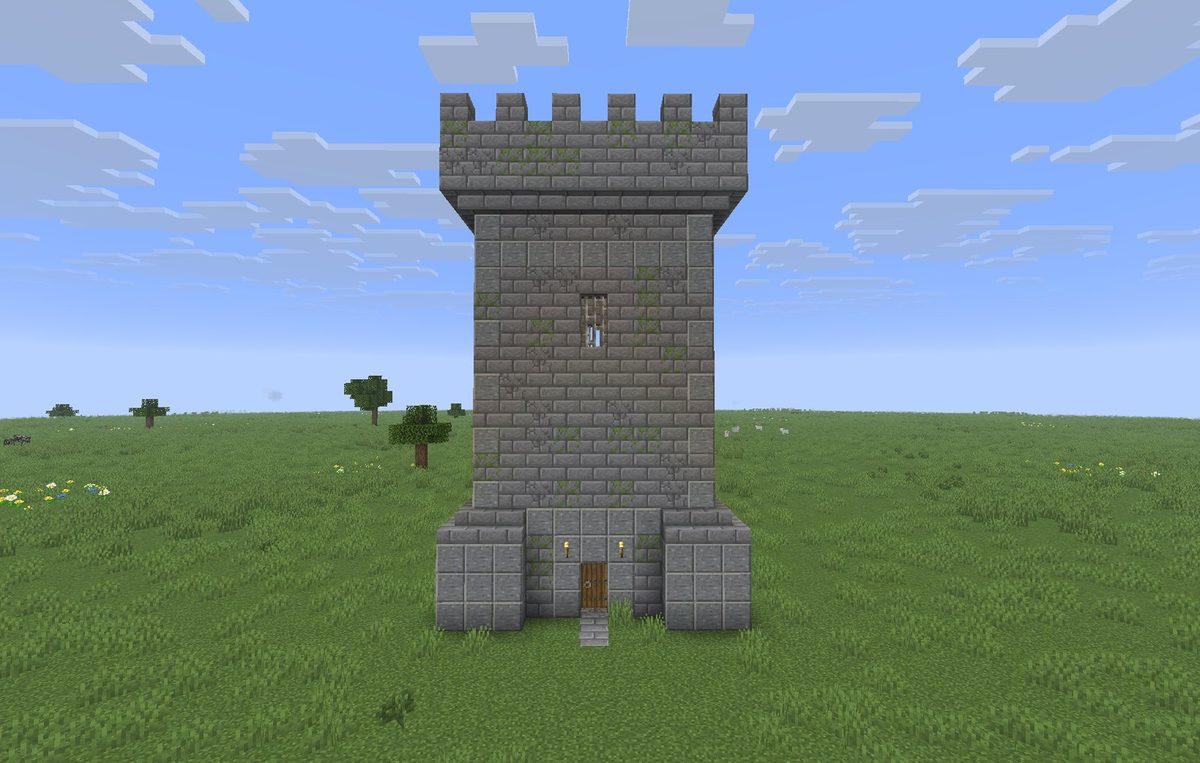 A CrawlSpace castle keep seen head on, the entrance door at its foot